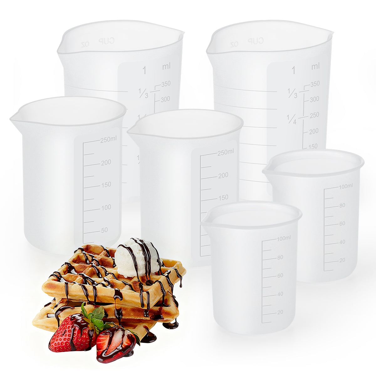 Set of clear measuring beakers with a dessert in the foreground on a white background
